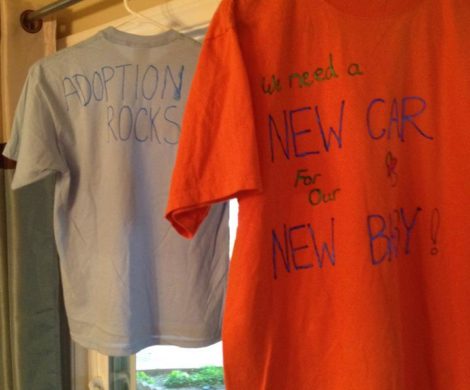 a blue and orange tee shirt decorated with puffy paint