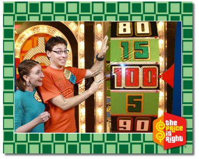 Man and woman Spinning the Showcase Showdown wheel at the Price is Right