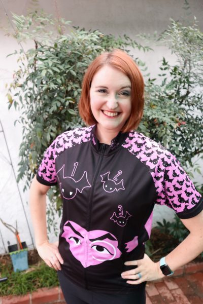 Woman smiling in the Sesame Street Count Cycling Jersey from Brainstorm