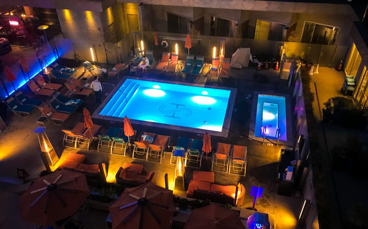 View of the pool and courtyard area from a balcony at The Shore Hotel Santa Monica