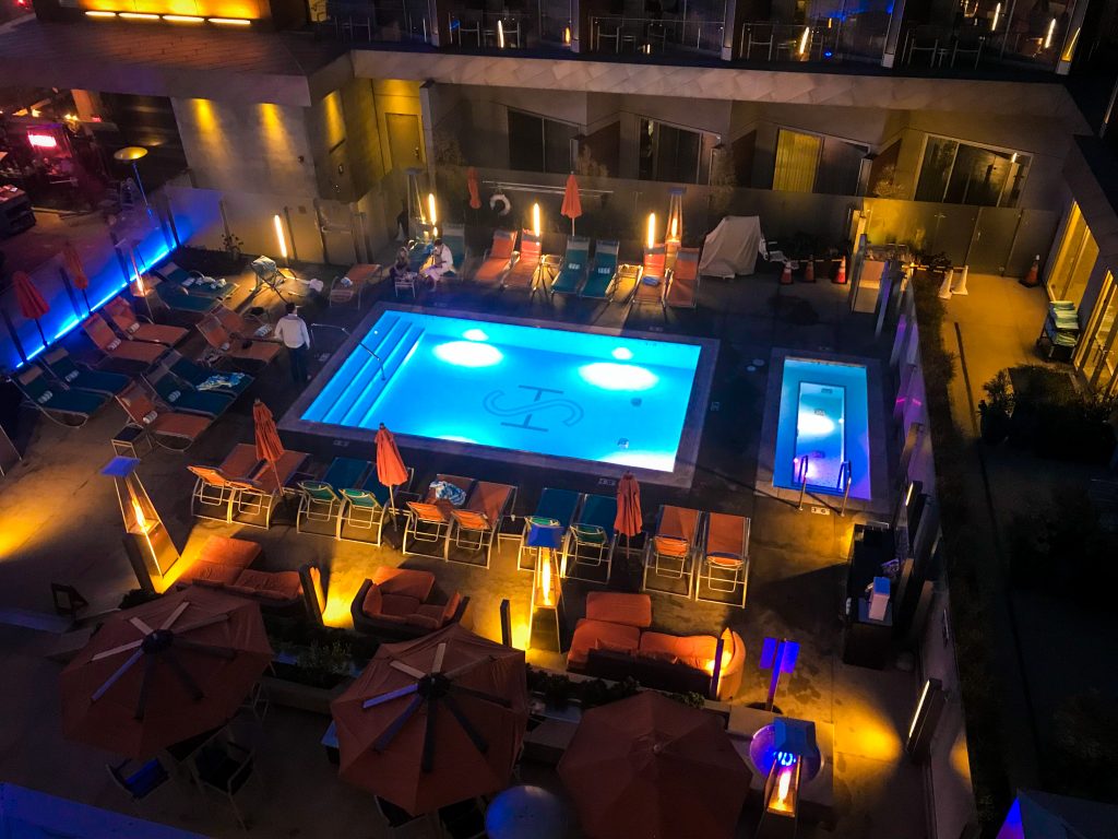 View of the pool and courtyard area from a balcony at The Shore Hotel Santa Monica