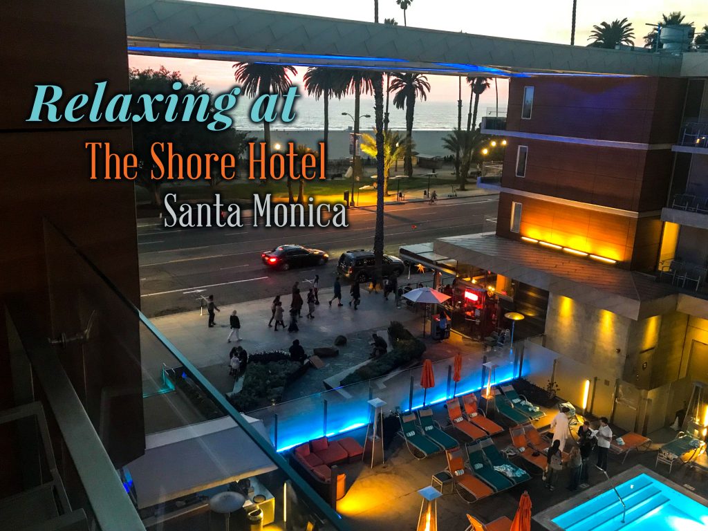 view from an ocean view balcony of The Shore Hotel in Santa Monica, overlooking the pool and the beach