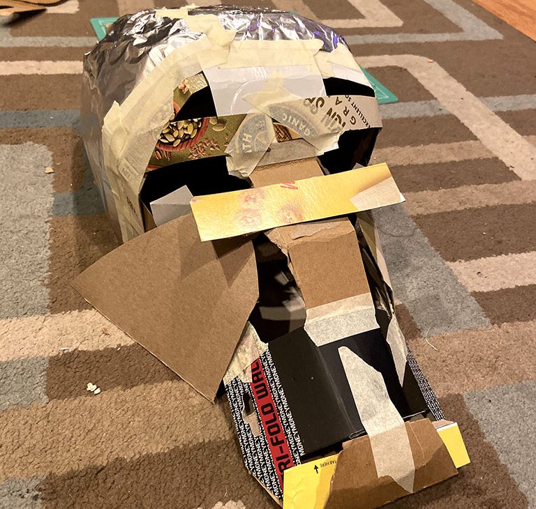 A cardboard build of a Dark Crystal Mystic mask